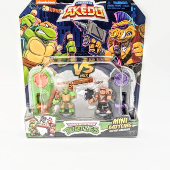 Akedo TMNT Michaelangelo vs. Bebop